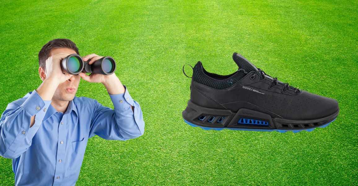 Man looking at some golf shoes that fit properly